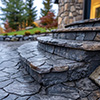 A masonry concrete front door steps.